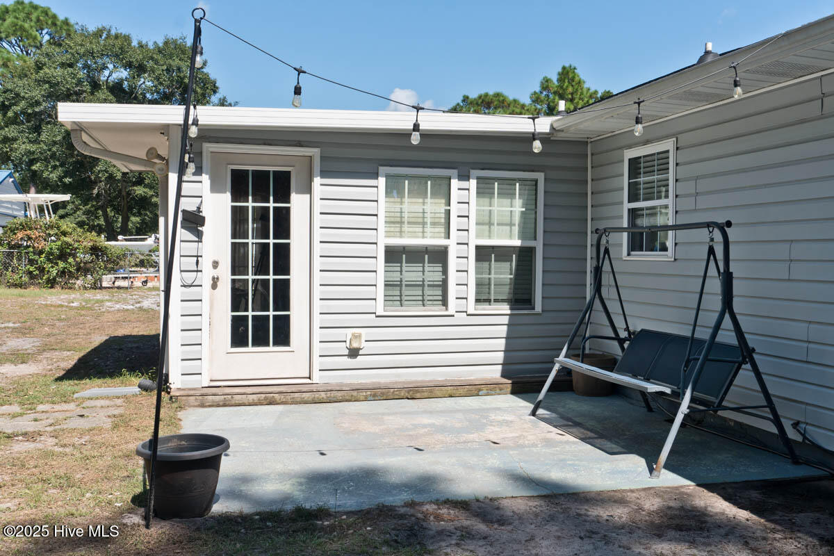 243 Barrington Ridge Bogue, NC 28570 - Photo 26 of 29 Patio off Sunroom