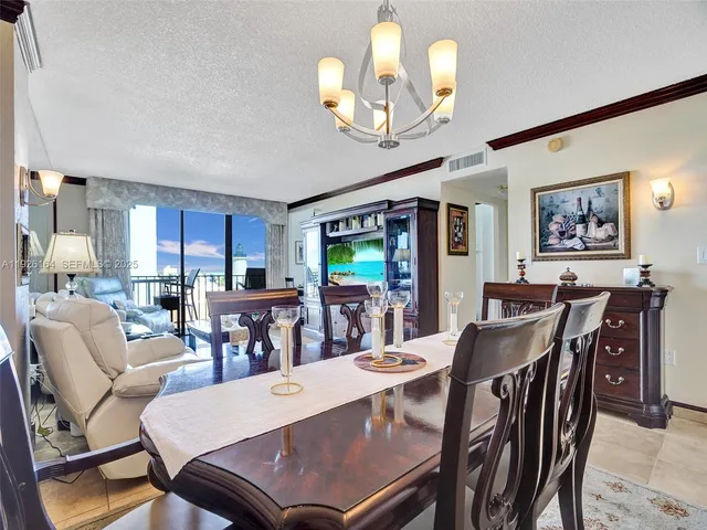 a view of a balcony with chairs
