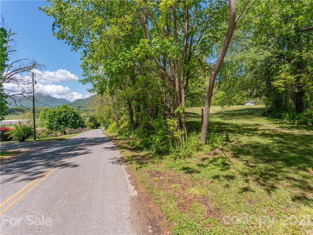 35 Rhea Park Ridge Canton, NC 28716 - Photo 1 of 11 a backyard of a house with lots of green space