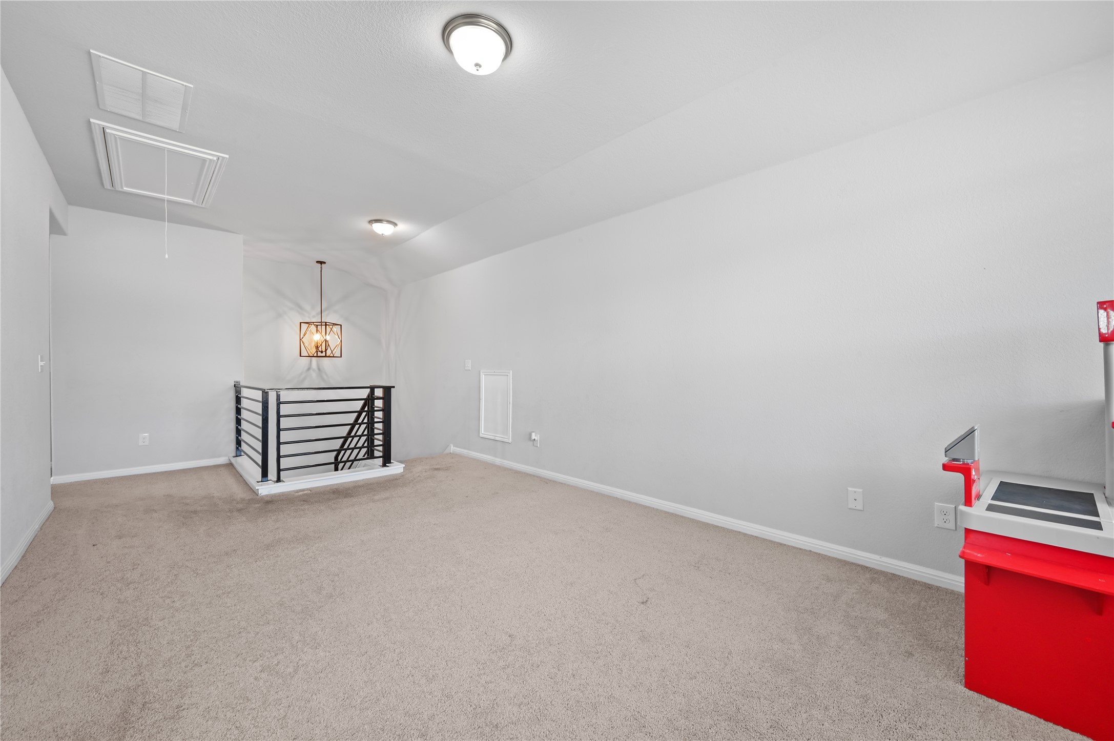 207 Dogvane Circle Kyle, TX 78640 - Photo 22 of 32 Below grade area with carpet flooring and baseboards