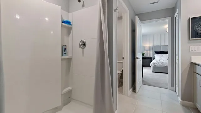 a bathroom with a sink and shower