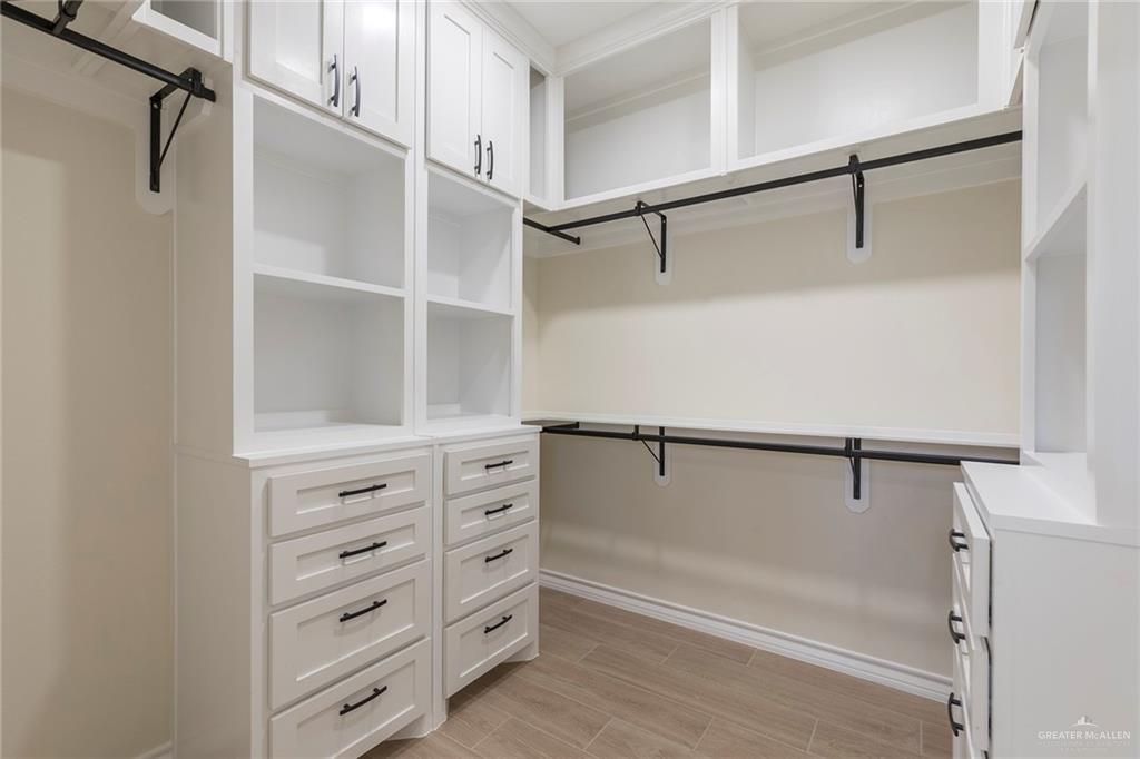 8030 North 50th Street McAllen, TX 78504 - Photo 13 of 23 Spacious closet with wood tiled floors