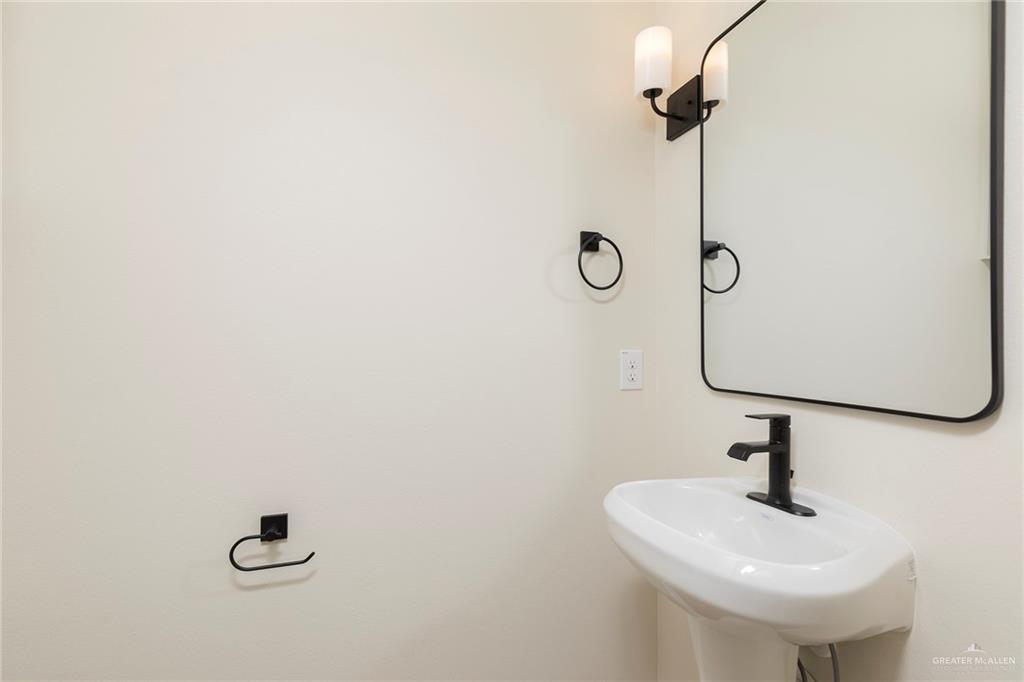 8030 North 50th Street McAllen, TX 78504 - Photo 16 of 23 Bathroom featuring a sink