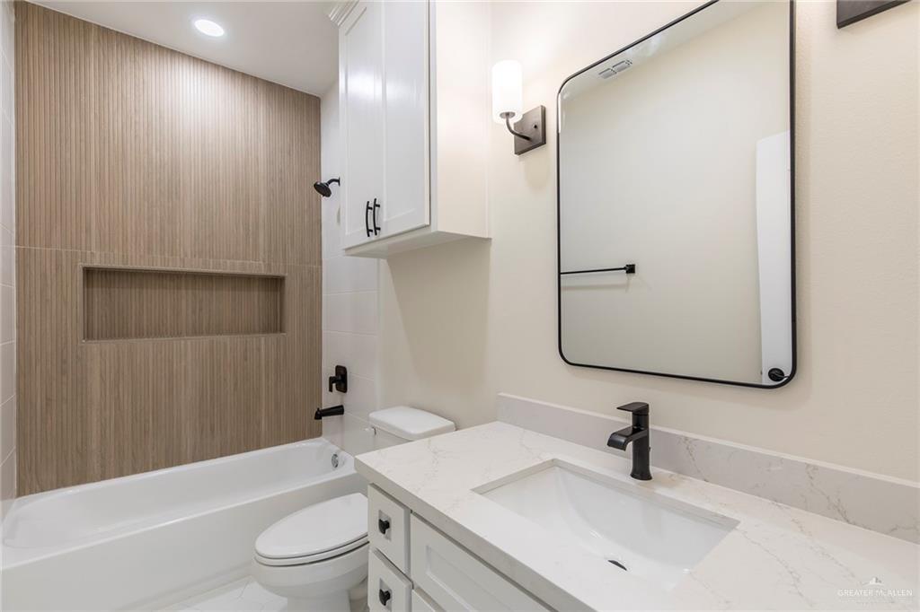 8030 North 50th Street McAllen, TX 78504 - Photo 19 of 23 Bathroom with shower / bathtub combination and vanity