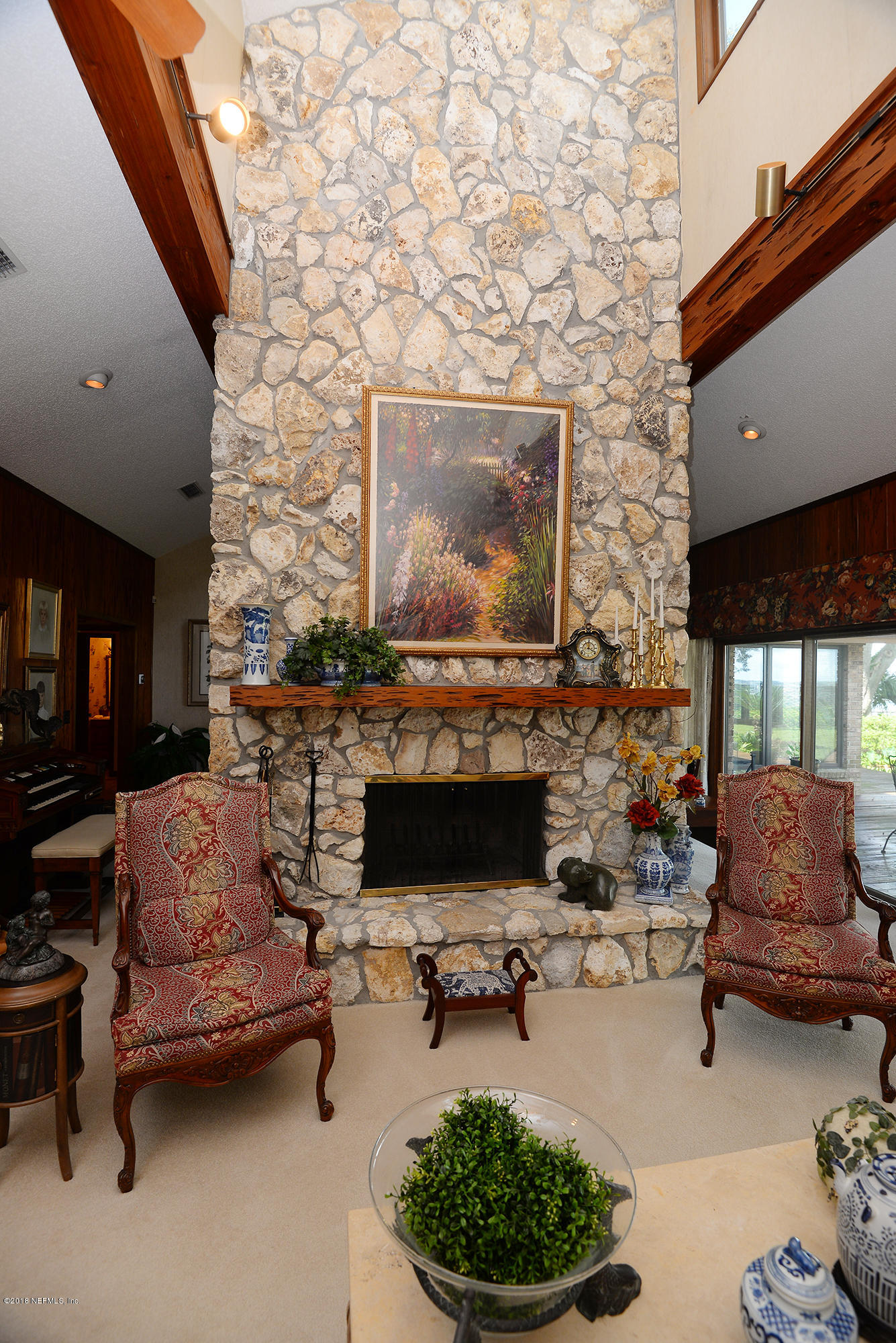 2963 Front Road Jacksonville, FL 32257 - Photo 13 of 63 a living room with furniture and a fireplace
