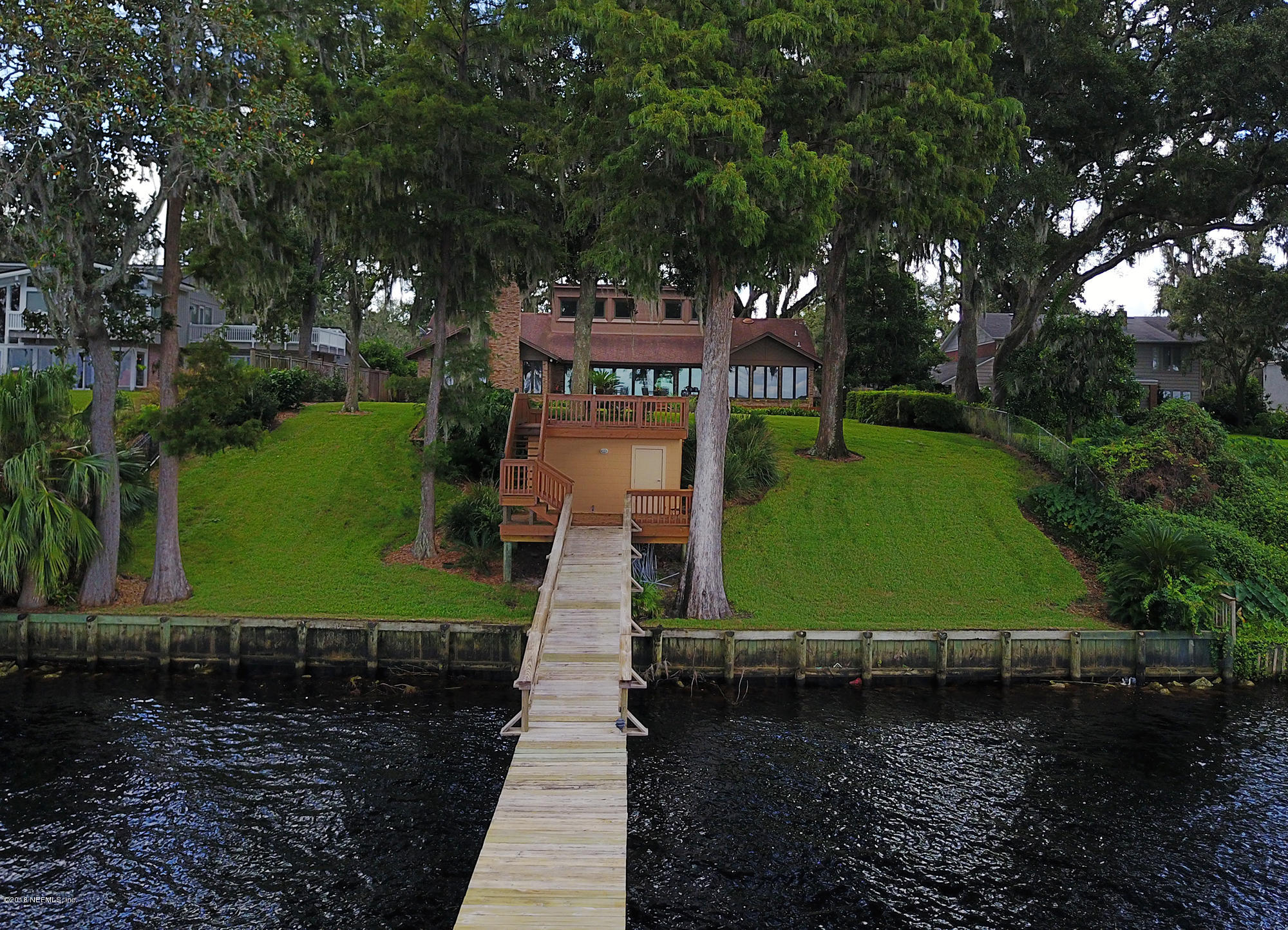 2963 Front Road Jacksonville, FL 32257 - Photo 6 of 63 a view of a water pond with large trees