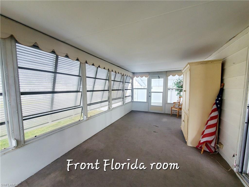 4 Topaz Lane, Unit T4 Naples, FL 34112 - Photo 7 of 17 a view of an empty room with a window