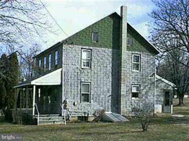 2288 Grandview Road Hanover, PA 17331 - Photo 1 of 1 a front view of a house with a garden