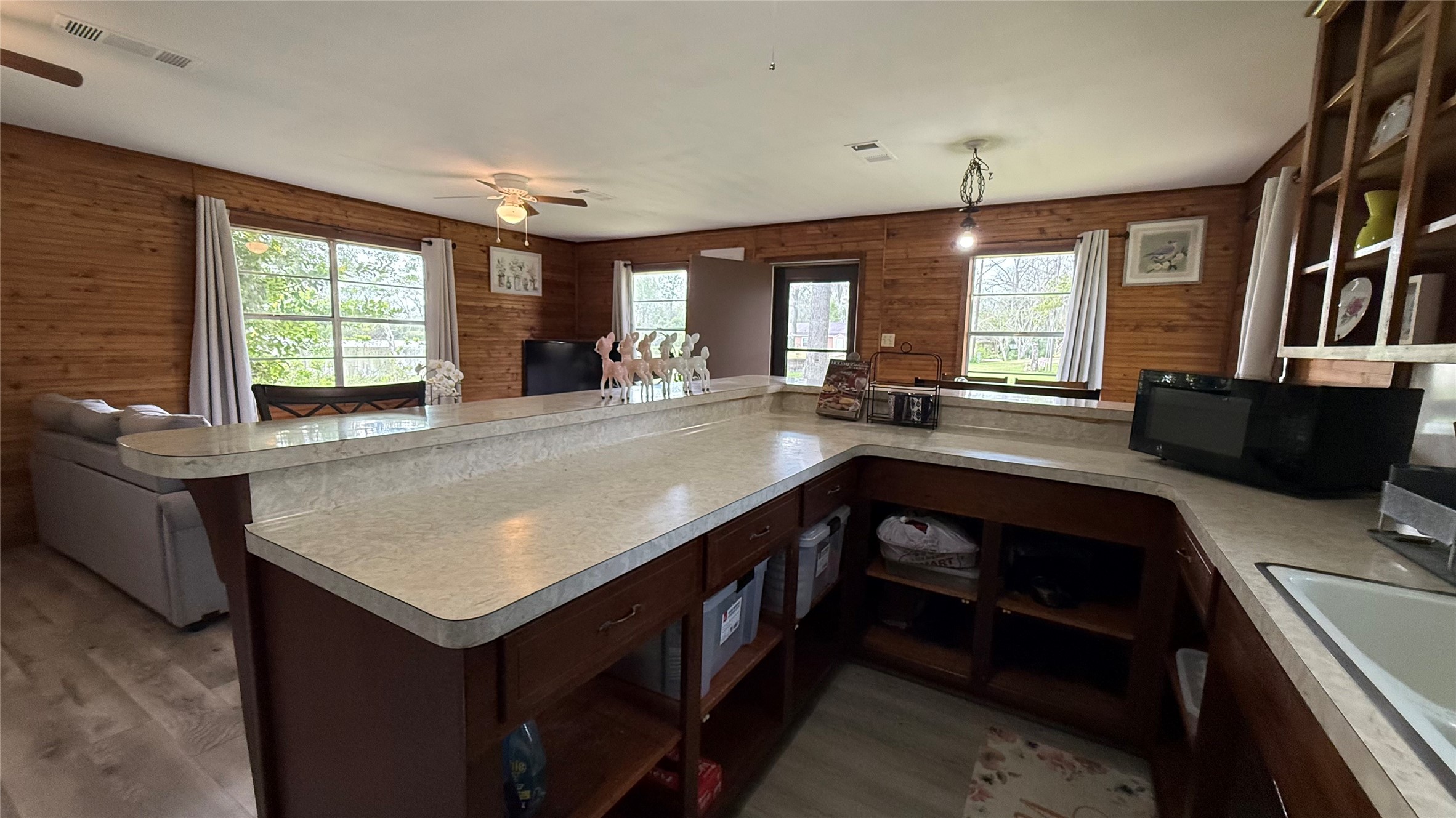 215 Weldon Livingston, TX 77351 - Photo 11 of 22 a kitchen with a stove a sink and a refrigerator