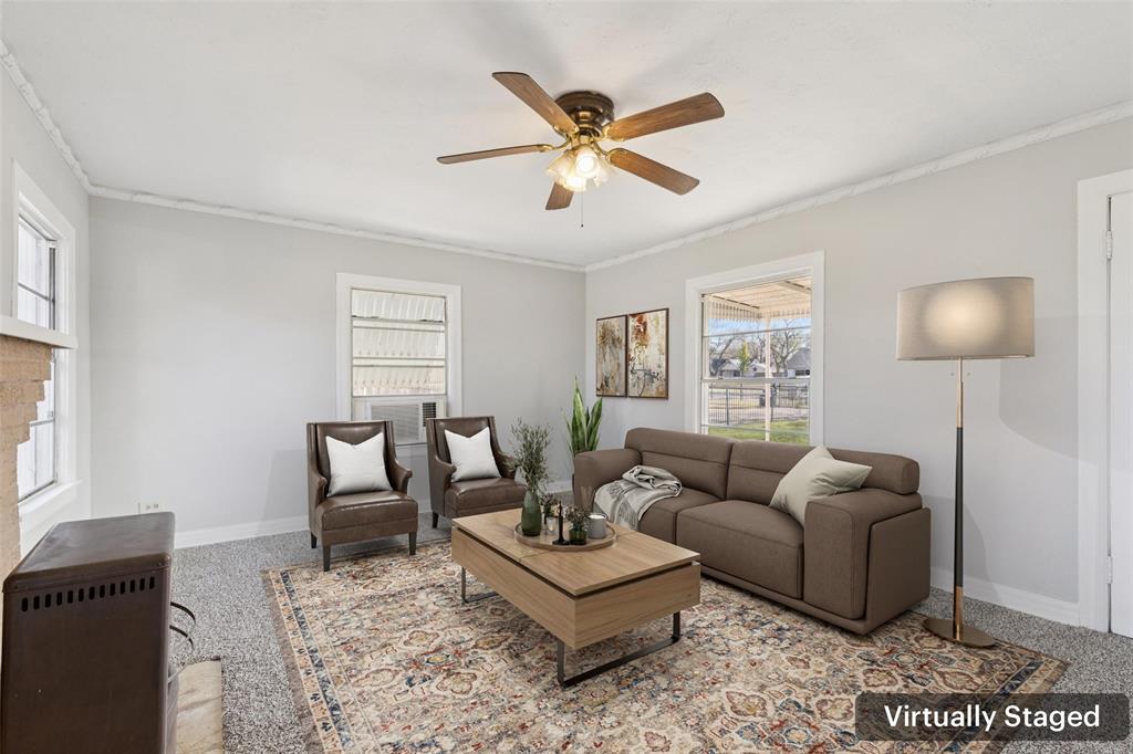10609 Seagoville Road Dallas, TX 75217 - Photo 16 of 33 a living room with furniture and a window