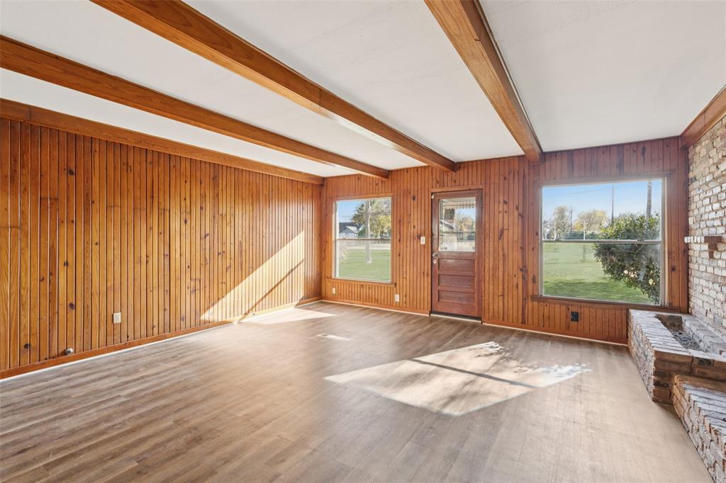 10609 Seagoville Road Dallas, TX 75217 - Photo 5 of 33 a view of an empty room with a window