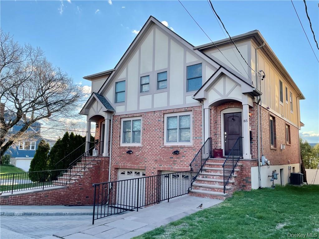 a front view of house with yard