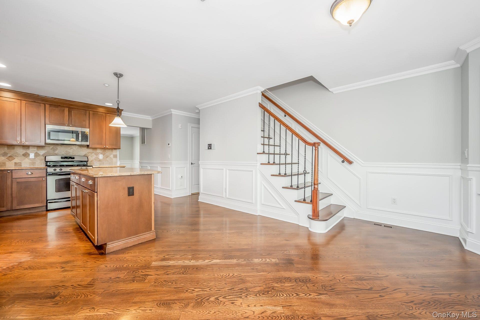 85 Park Avenue, Unit RIGHT SIDE West Harrison, NY 10604 - Photo 14 of 46 a view of kitchen with wooden floor and electronic appliances