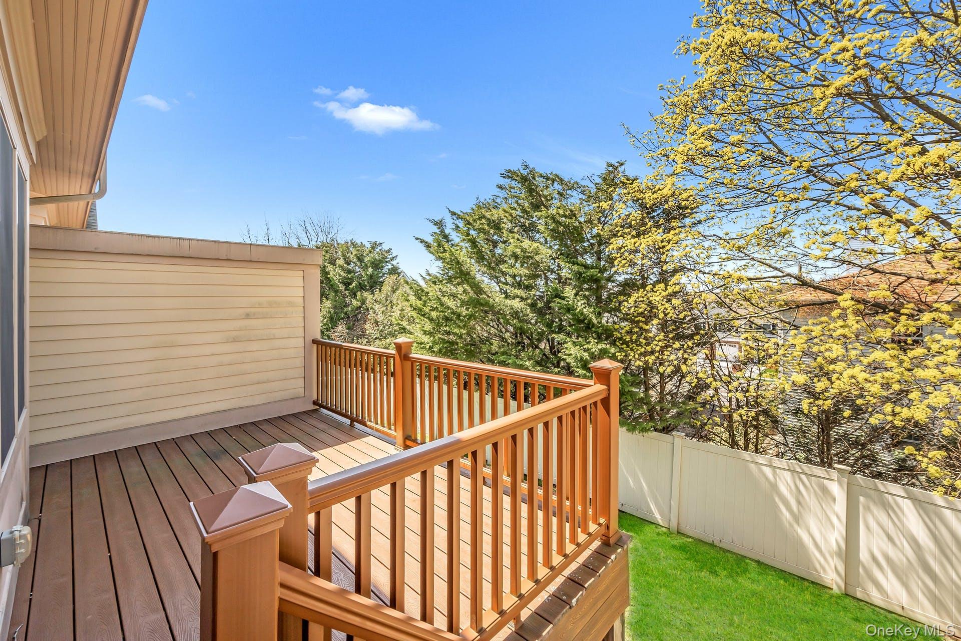 85 Park Avenue, Unit RIGHT SIDE West Harrison, NY 10604 - Photo 36 of 46 a view of balcony with wooden floor and fence