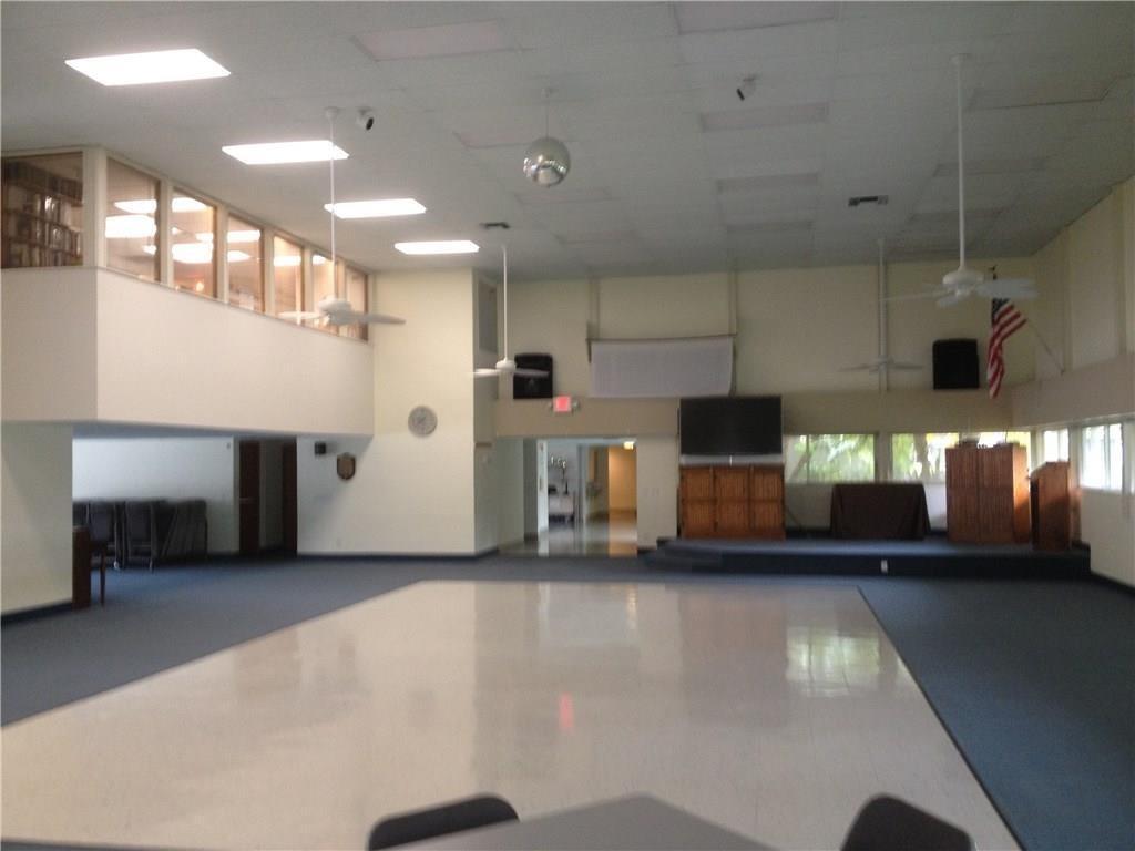 1225 Northwest 21st Street, Unit 2003 Stuart, FL 34994 - Photo 30 of 30 a view of a lobby with black and white car