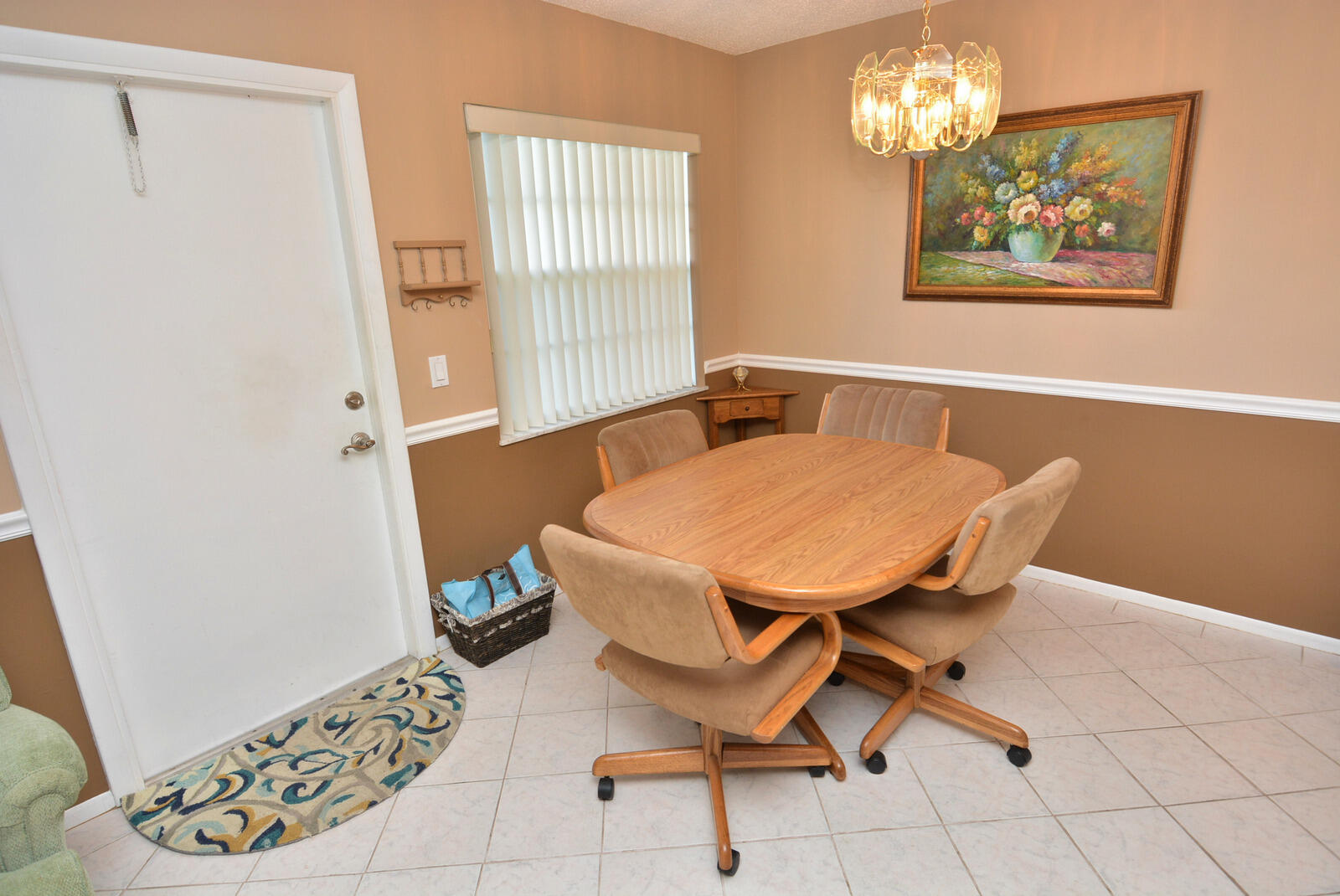 1225 Northwest 21st Street, Unit 2003 Stuart, FL 34994 - Photo 3 of 30 a dining room with furniture and window