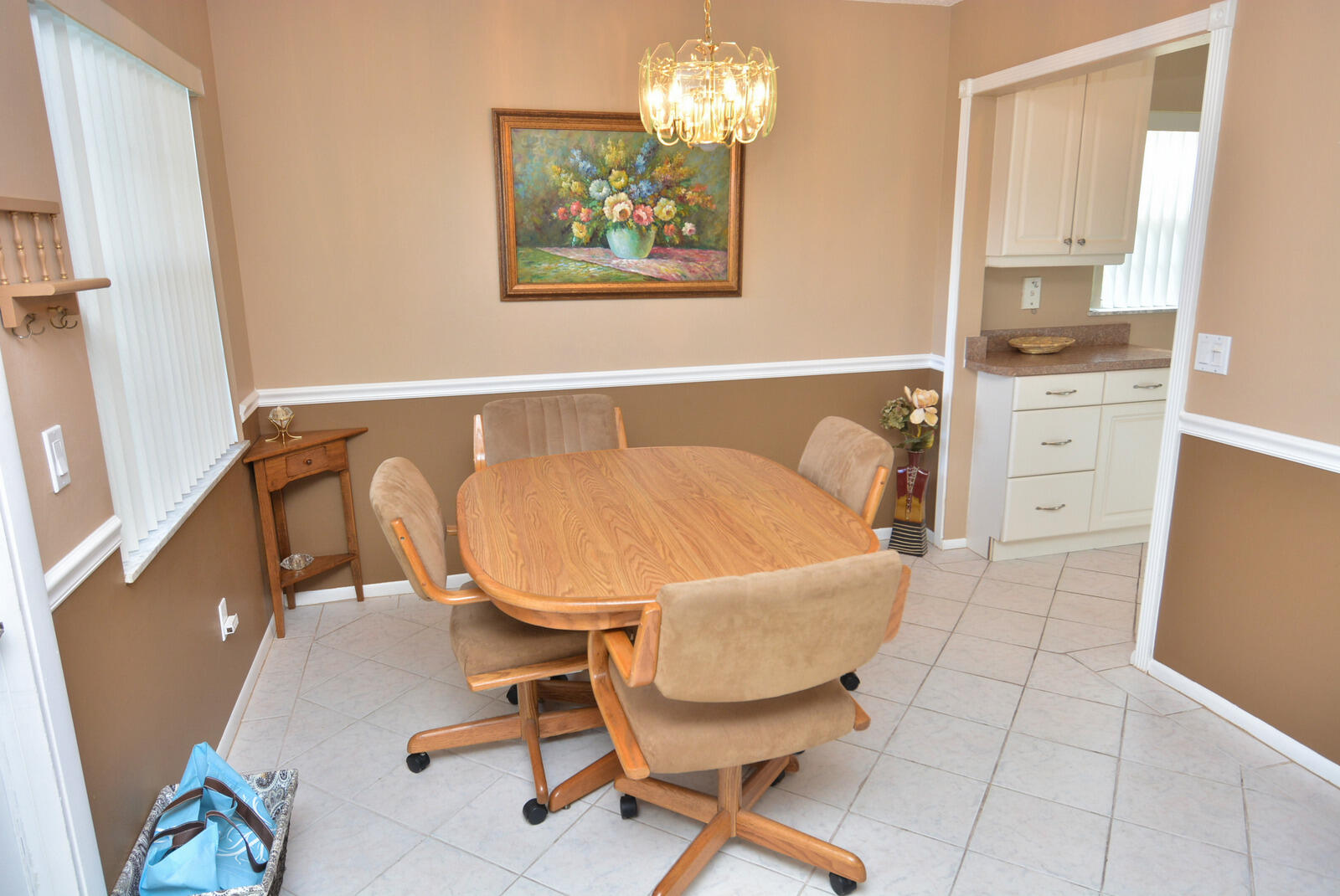 1225 Northwest 21st Street, Unit 2003 Stuart, FL 34994 - Photo 4 of 30 a view of a workspace with furniture and a window