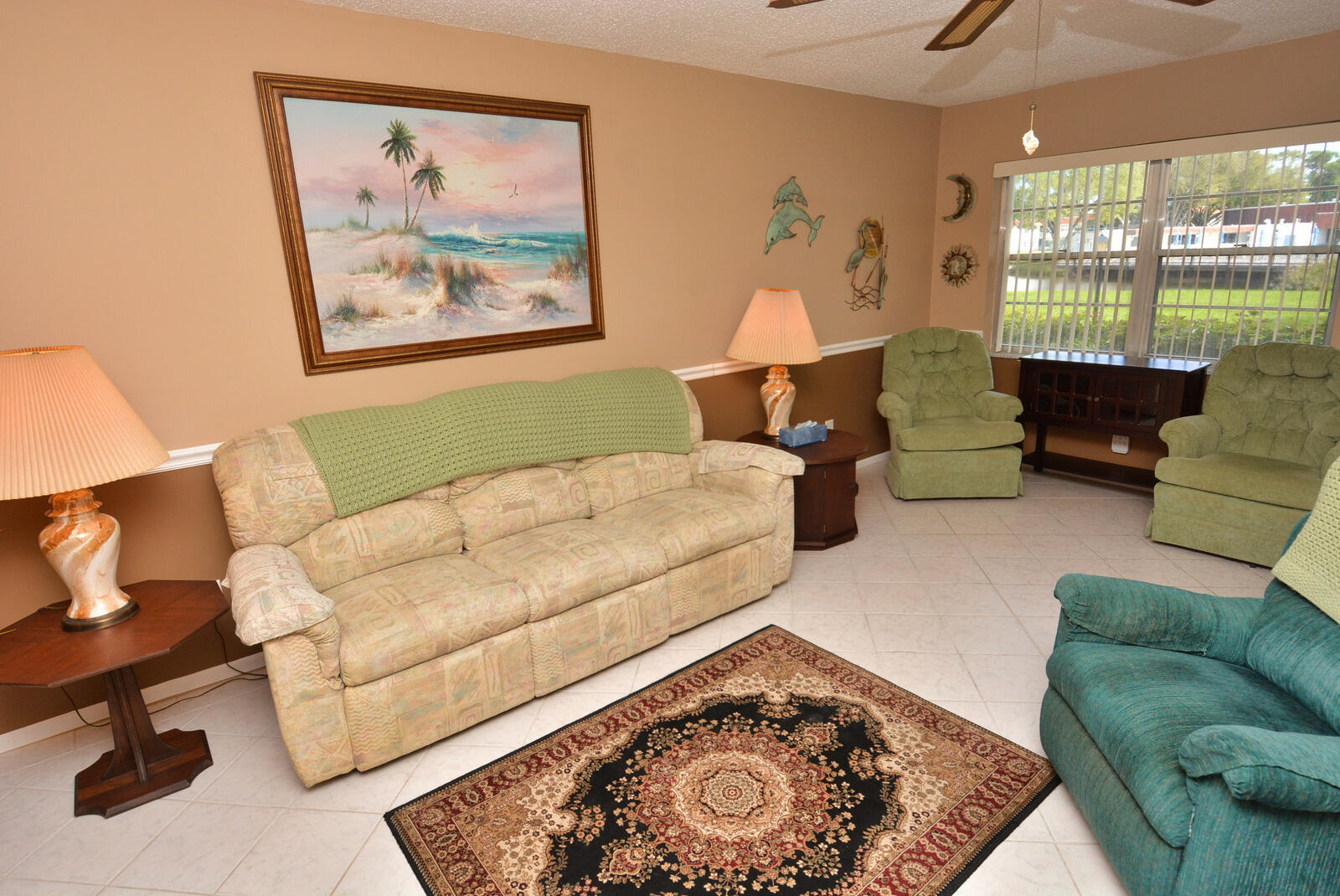 1225 Northwest 21st Street, Unit 2003 Stuart, FL 34994 - Photo 9 of 30 a living room with furniture and a rug