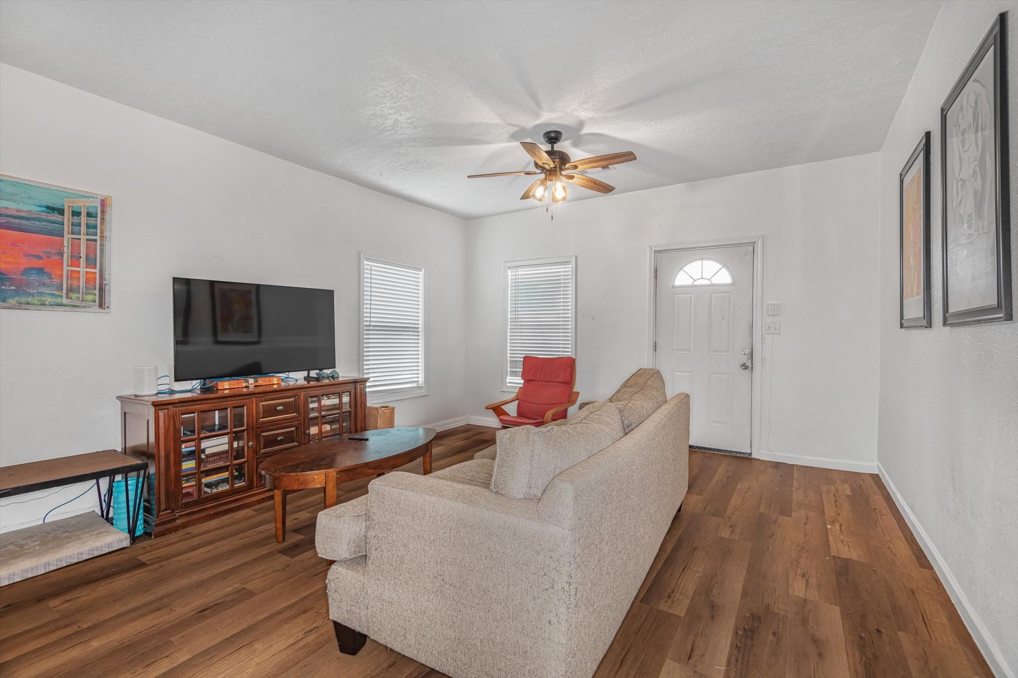 905 43rd Street Galveston, TX 77550 - Photo 28 of 43 Living room featuring the new vinyl floors.