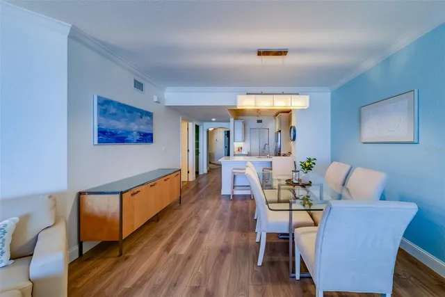 a spacious bathroom with a double vanity sink a mirror and a shower