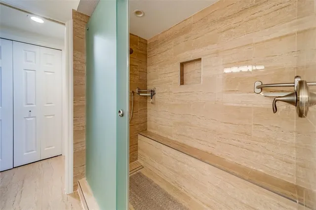a view of a livingroom with wooden floor and staircase