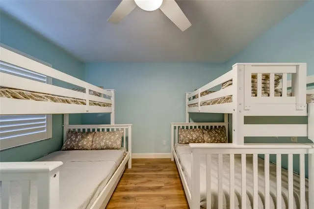 a view of a livingroom with furniture and a window
