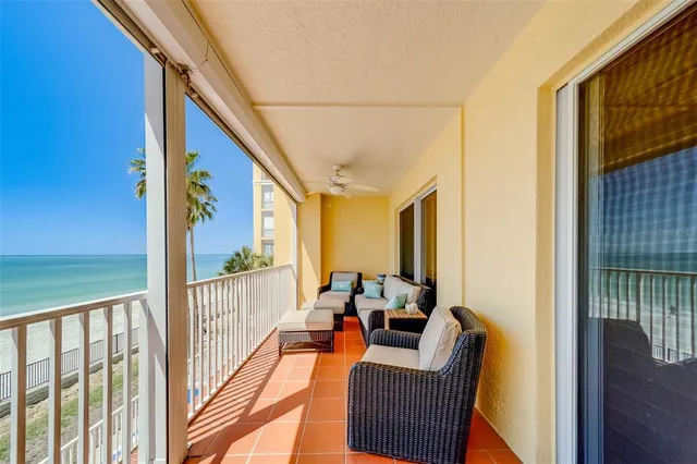 a view of a building with sitting area