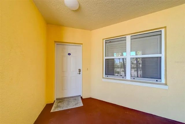 a kitchen with stainless steel appliances white cabinets and a stove