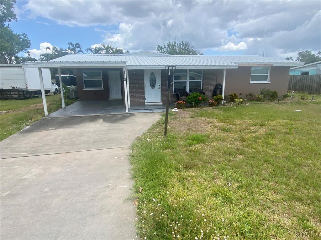 110 Paddington Road Venice, FL 34293 - Photo 1 of 1 a view of a house with backyard porch and sitting area