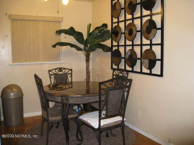 10566 Dodd Road Jacksonville, FL 32218 - Photo 6 of 19 a view of a workspace with furniture