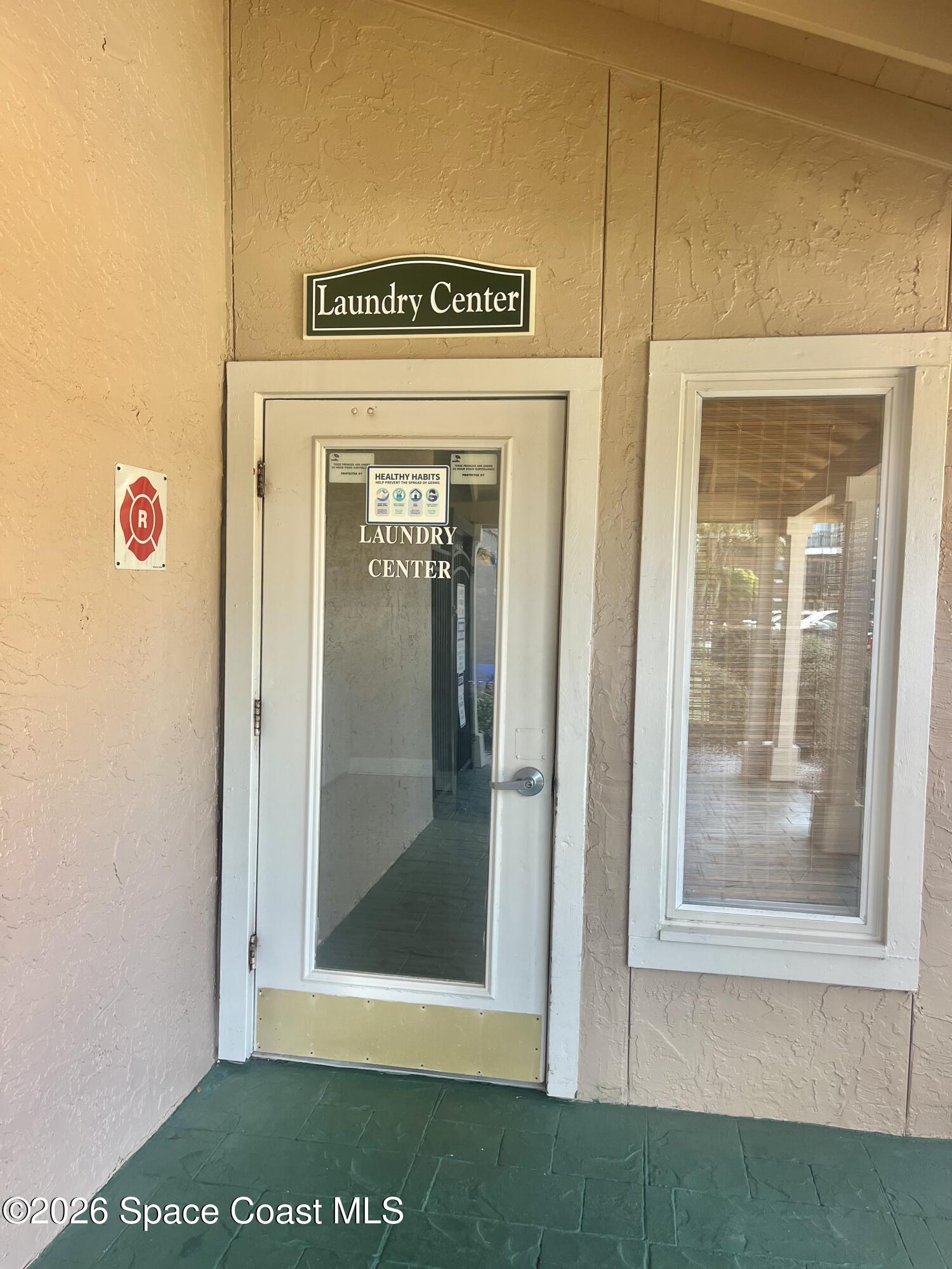7667 North Wickham Road, Unit 1118 Melbourne, FL 32940 - Photo 25 of 26 a view of a door of a house