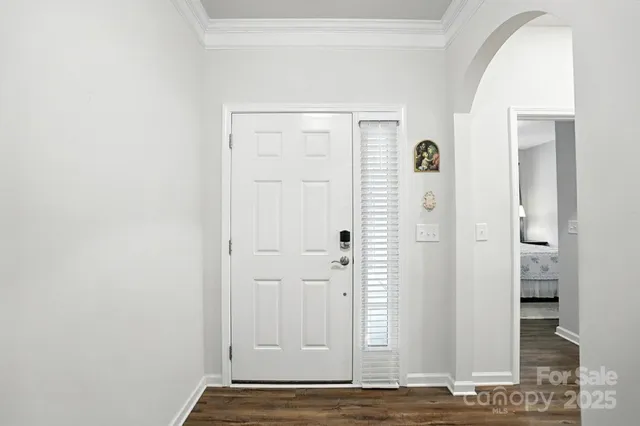 a view of a livingroom with wooden floor