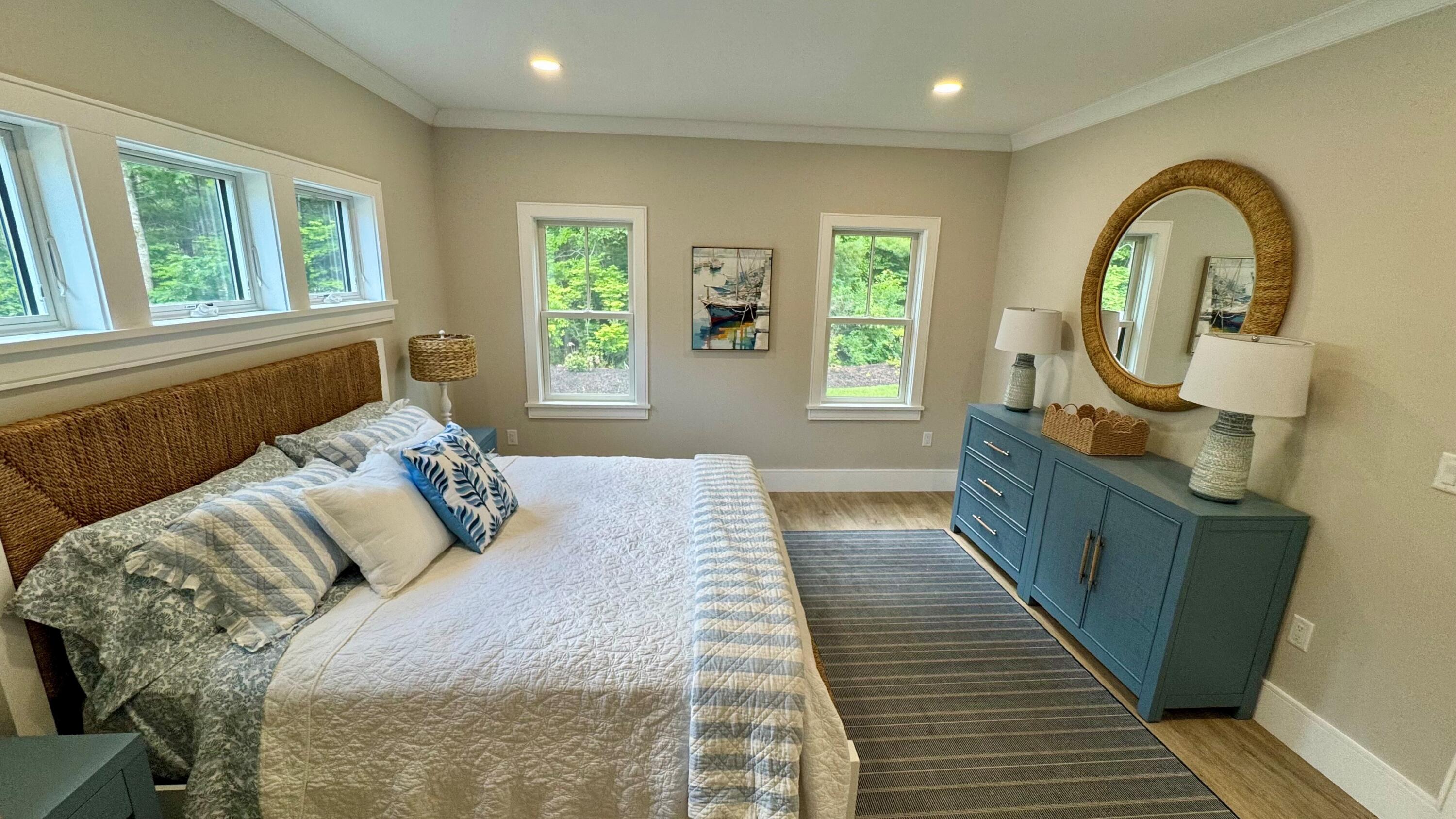 4 Josiah Path Falmouth, MA 02540 - Photo 11 of 26 a bed sitting in a bedroom next to a window