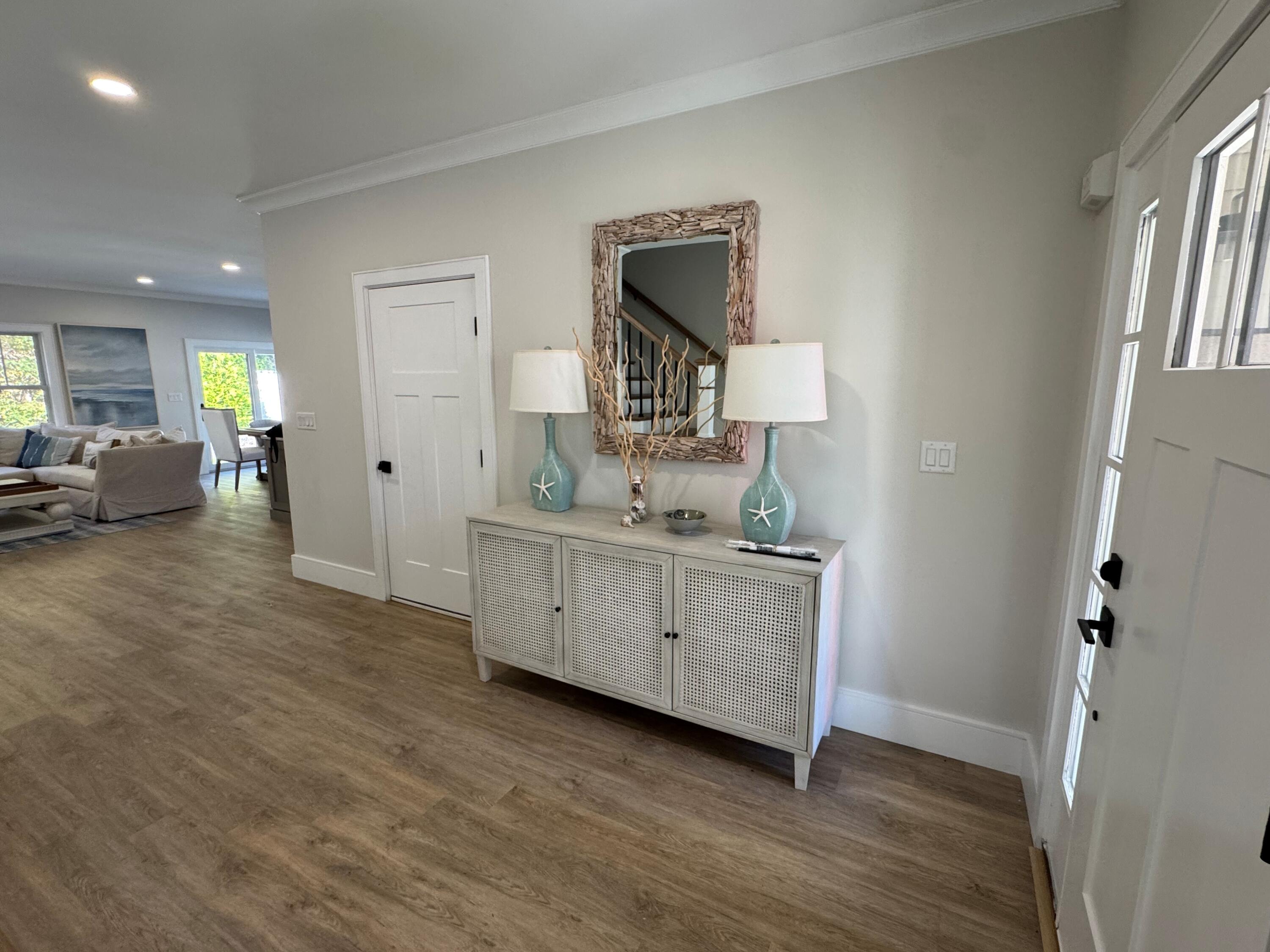 4 Josiah Path Falmouth, MA 02540 - Photo 14 of 26 a spacious bathroom with a double vanity sink and a mirror