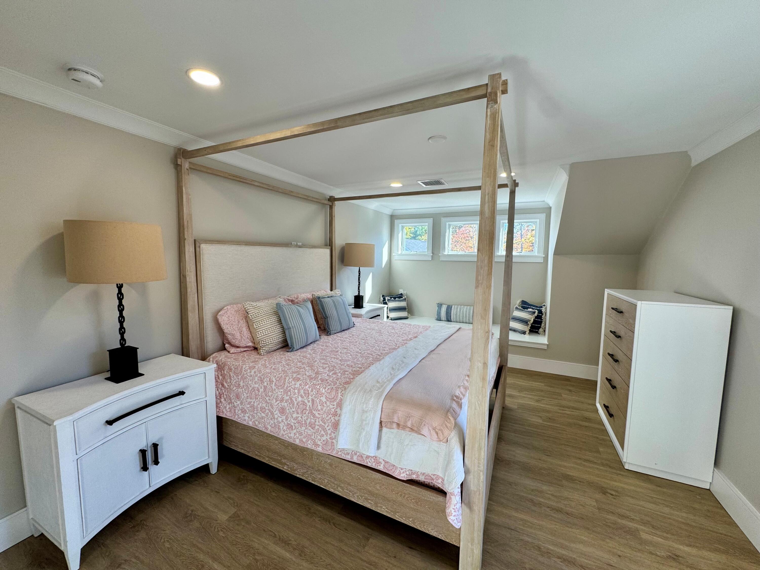 4 Josiah Path Falmouth, MA 02540 - Photo 19 of 29 a bedroom with a bed and a lamp