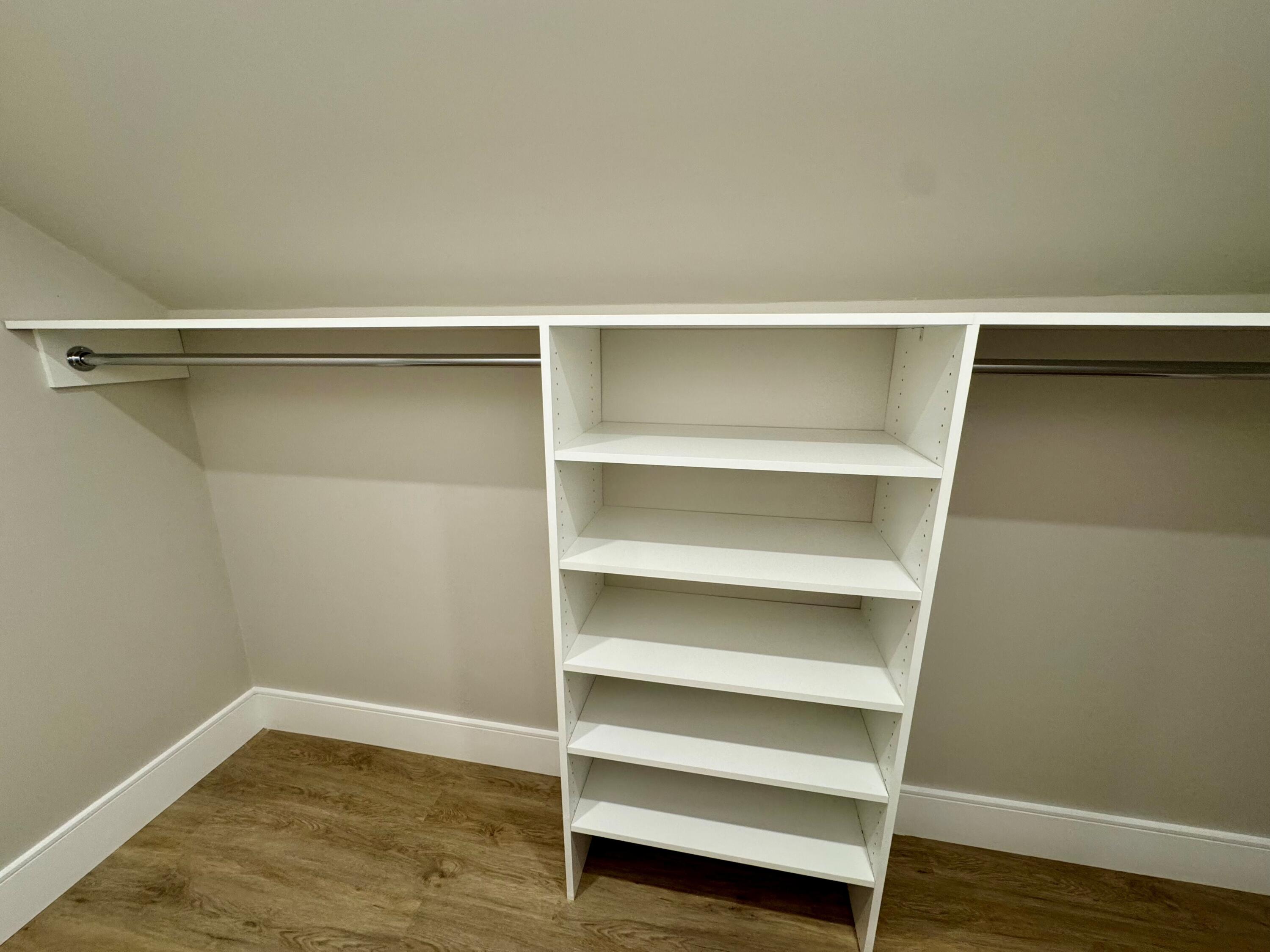 4 Josiah Path Falmouth, MA 02540 - Photo 22 of 29 a view of walk in closet with empty racks
