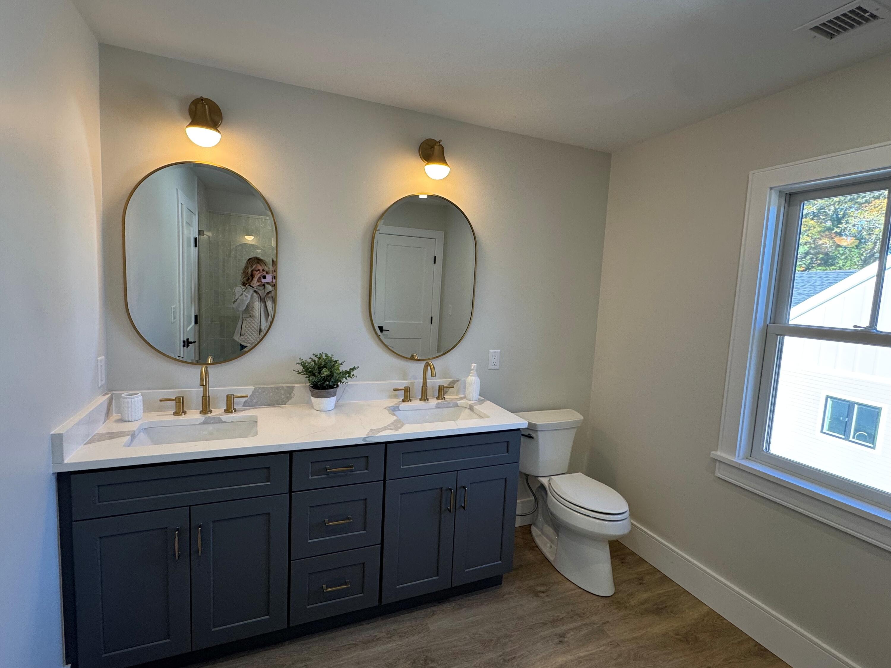4 Josiah Path Falmouth, MA 02540 - Photo 24 of 26 a bathroom with 2 sink and a mirror