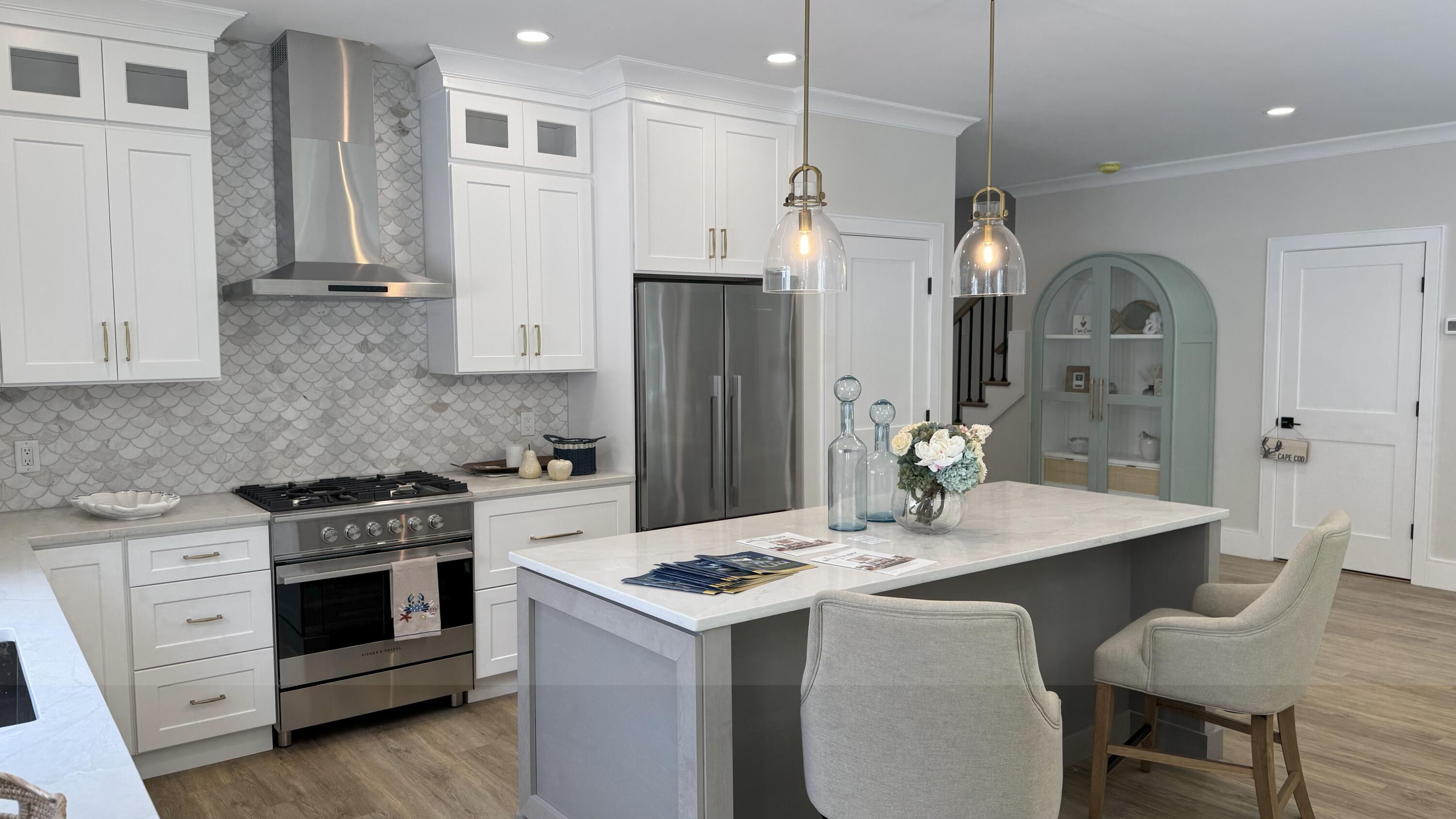 4 Josiah Path Falmouth, MA 02540 - Photo 3 of 26 a kitchen with a stove a sink and a refrigerator