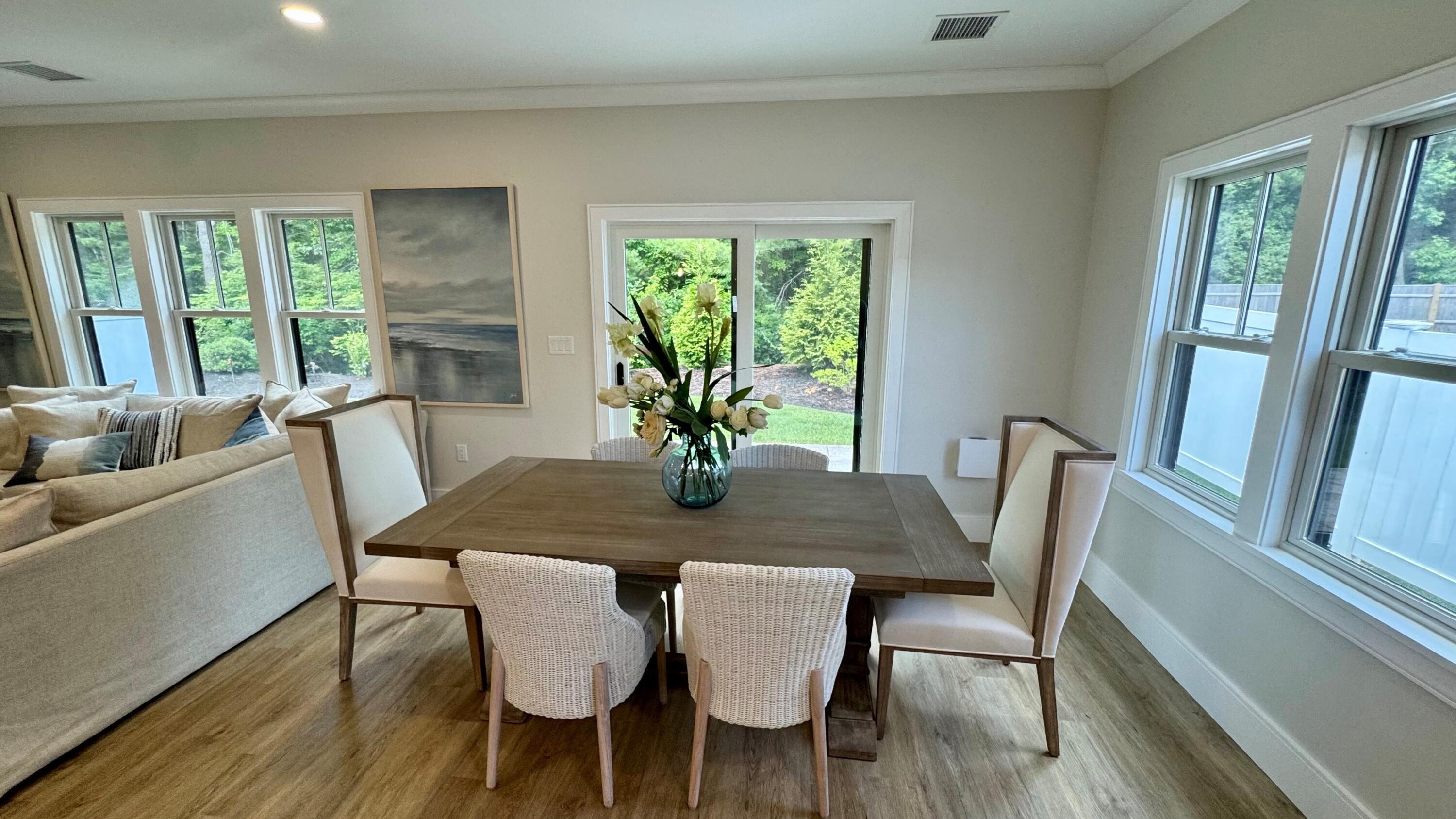 4 Josiah Path Falmouth, MA 02540 - Photo 3 of 29 a view of a dining room with furniture window and wooden floor