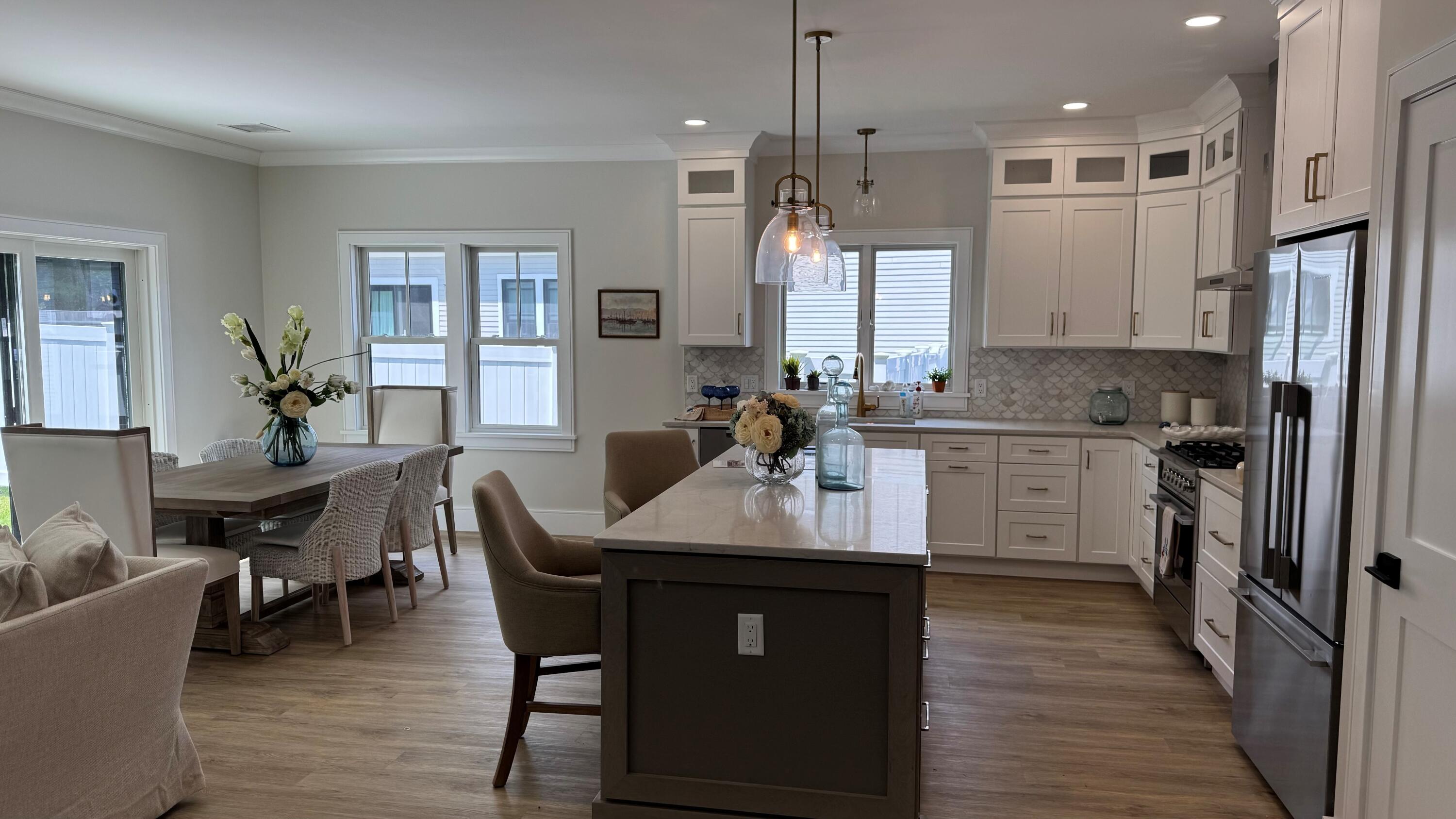 4 Josiah Path Falmouth, MA 02540 - Photo 5 of 29 a kitchen with granite countertop a sink appliances and cabinets