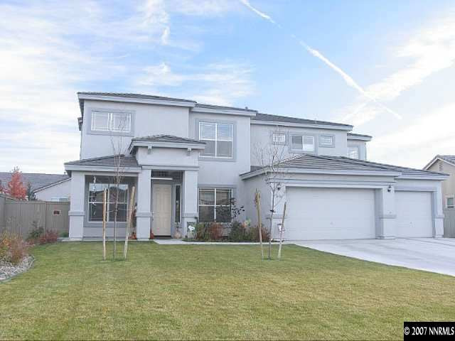 1626 Moquith Court Reno, NV 89521 - Photo 1 of 9 front view of a house with a garden