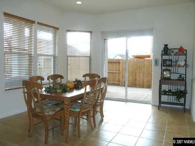 1626 Moquith Court Reno, NV 89521 - Photo 4 of 9 a view of a dining room with furniture and window