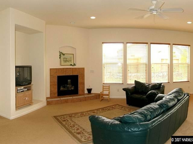 1626 Moquith Court Reno, NV 89521 - Photo 5 of 9 a living room with furniture and a fireplace
