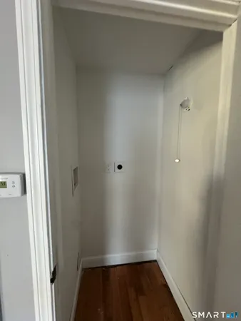 a view of small space with wooden floor