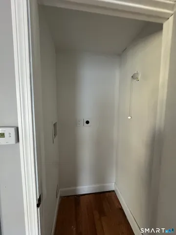 a view of small space with wooden floor