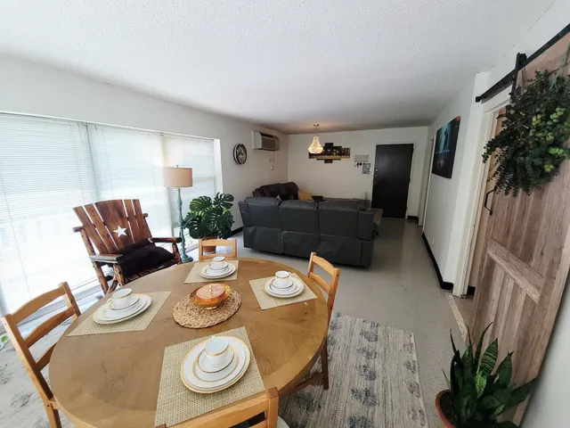 a view of a livingroom with a staircase
