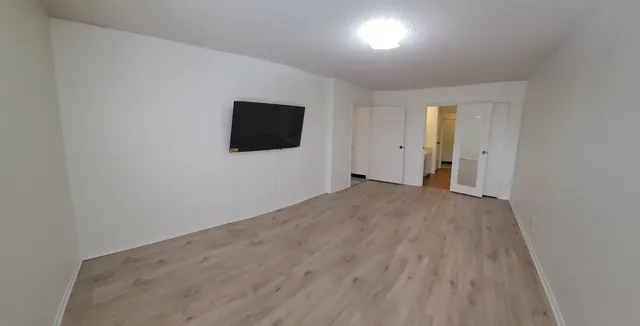 a bathroom with a sink a mirror and vanity