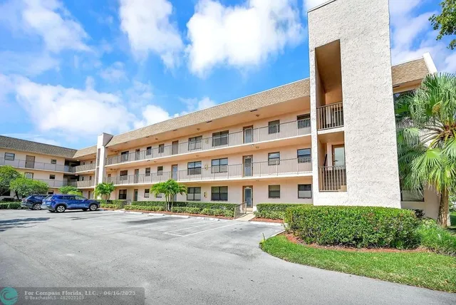 a front view of a building with street view
