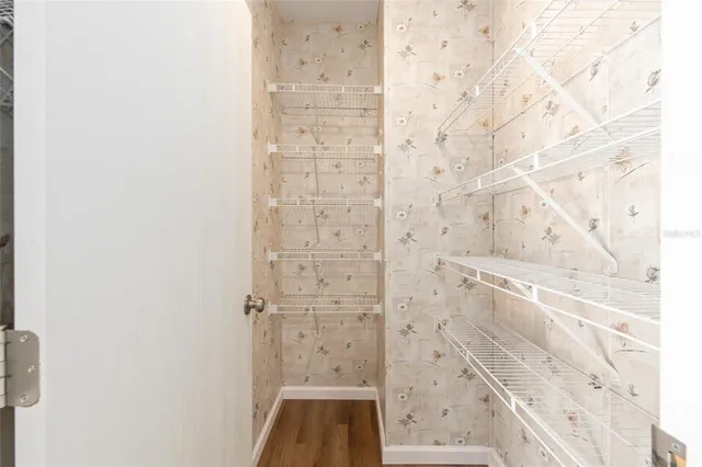 a kitchen with a sink and refrigerator
