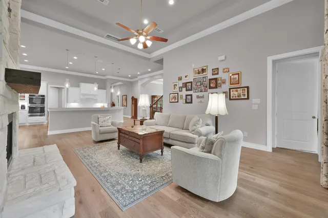 wooden floor in white cabinets
